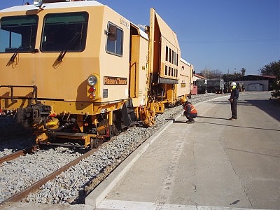 방향정정 및 면맞춤 기계.jpg